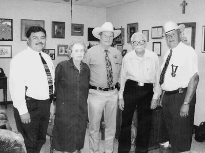 Former Sheriff John Francklow receiving badge