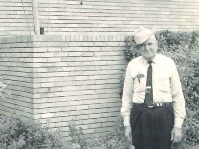 Sheriff Johnson stands outside the Grimes County Jail in the 1960s.